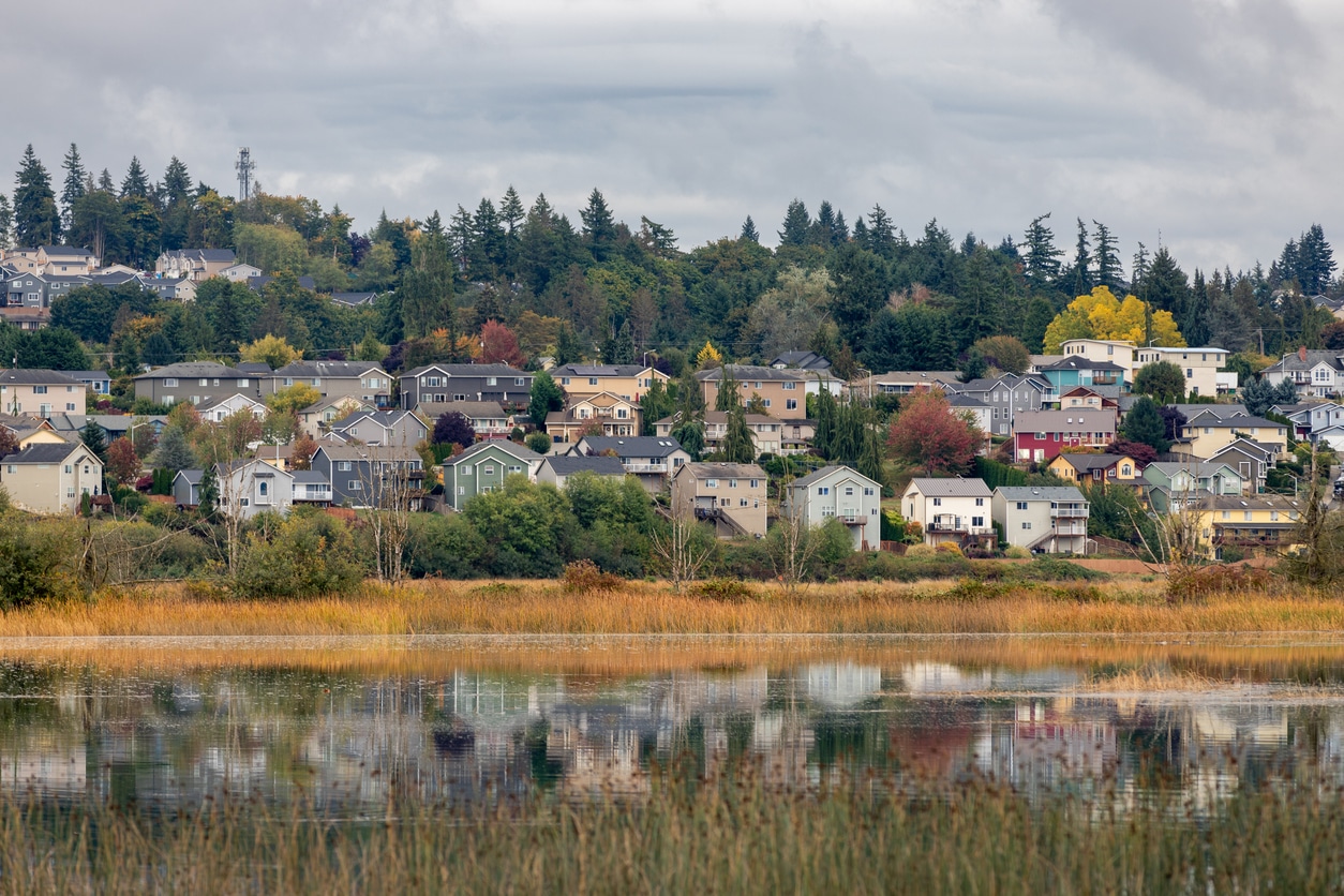 colorful houses along the ridge up from the estuary in Marysville WA